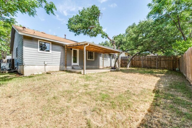 7901 Keswick Dr, Austin, TX 78745 - back of house featuring a patio area and a fenced backyard