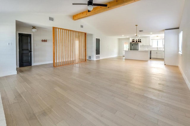 7901 Keswick Dr, Austin, TX 78745 - unfurnished living room with ceiling fan and light wood-style flooring