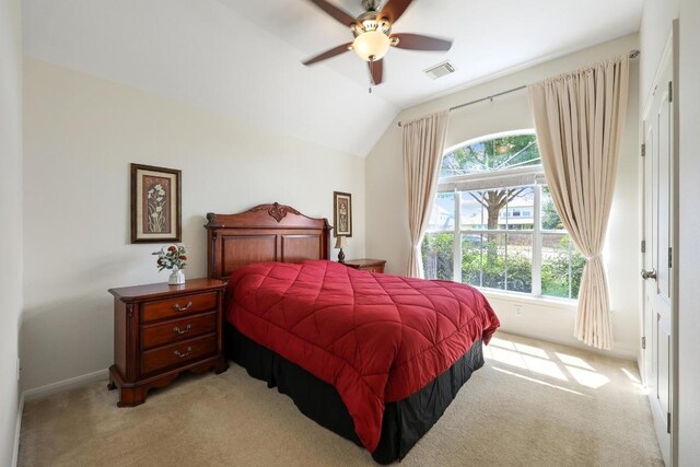 2013 Tillman Dr, Cedar Park, TX 78613 - bedroom featuring light carpet, lofted ceiling, baseboards, and ceiling fan
