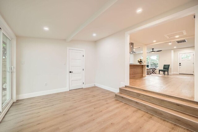 foyer with recessed lighting, baseboards, visible vents, and light wood-style floors