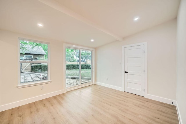 901 E 55th St, Austin, TX 78751 - spare room with light wood-style flooring, lofted ceiling, and recessed lighting