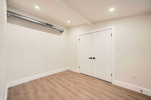 interior space with recessed lighting, baseboards, and light wood finished floors