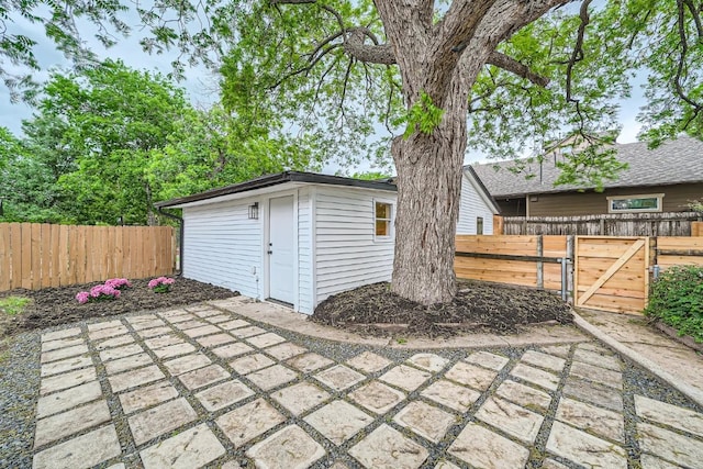 view of patio / terrace with fence and a gate