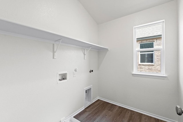 3756 Liberi Ln, Round Rock, TX 78665 - washroom with hookup for a gas dryer, dark wood-style flooring, hookup for a washing machine, and baseboards