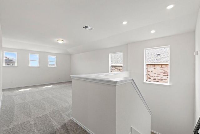 3756 Liberi Ln, Round Rock, TX 78665 - hallway with an upstairs landing, baseboards, light carpet, and recessed lighting