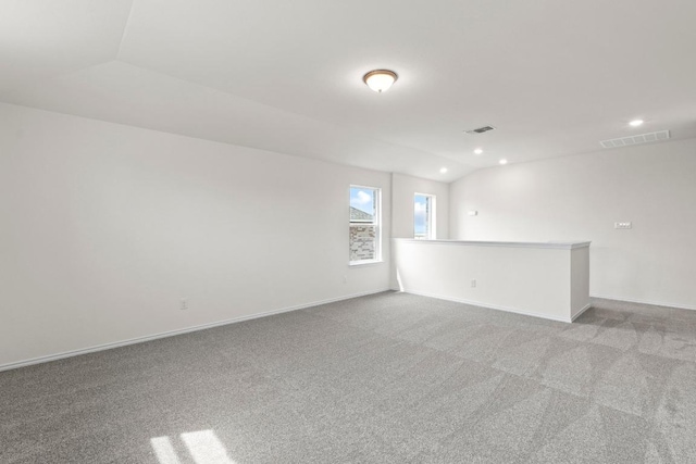 3756 Liberi Ln, Round Rock, TX 78665 - empty room featuring carpet flooring, recessed lighting, baseboards, and lofted ceiling