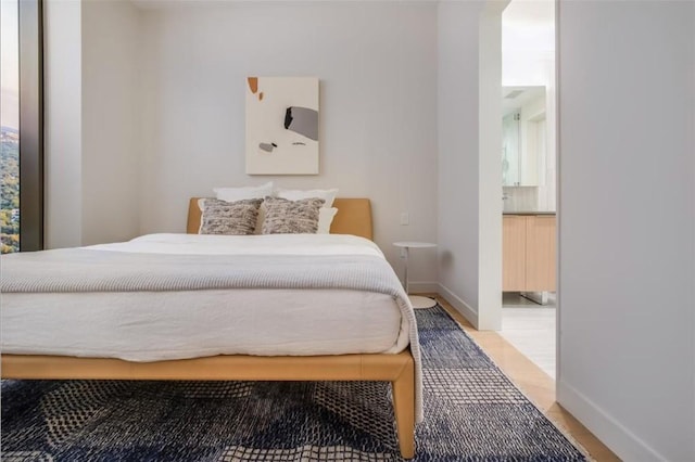 bedroom with baseboards