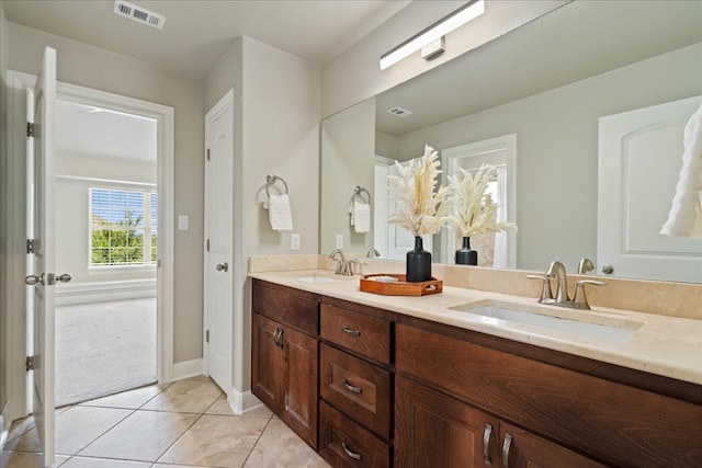 4211 Front Range Ln, Austin, TX 78732 - full bathroom with visible vents, tile patterned flooring, double vanity, and a sink