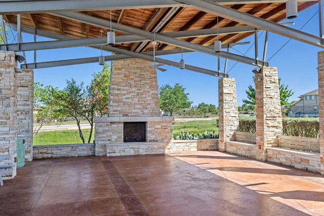 1401 Clearwing Cir, Georgetown, TX 78626 - view of patio with an outdoor stone fireplace