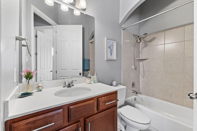 1401 Clearwing Cir, Georgetown, TX 78626 - full bath featuring vanity, toilet, tub / shower combination, and a textured wall
