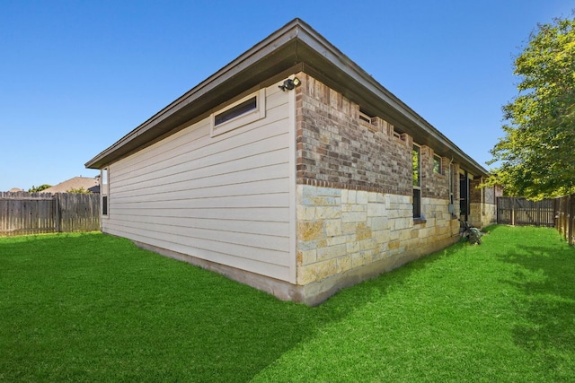 1401 Clearwing Cir, Georgetown, TX 78626 - view of side of property featuring stone siding