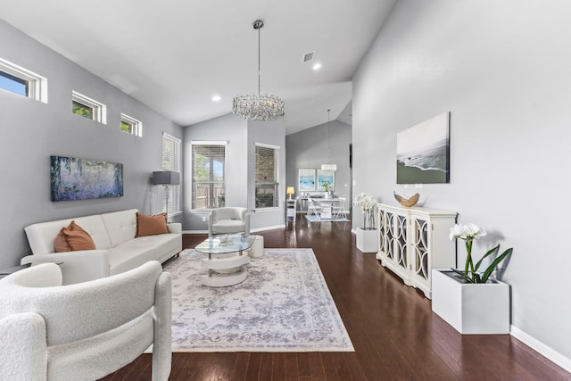 1401 Clearwing Cir, Georgetown, TX 78626 - living room with a chandelier, wood finished floors, baseboards, high vaulted ceiling, and recessed lighting