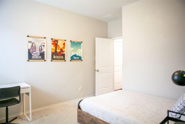 bedroom featuring baseboards and carpet flooring