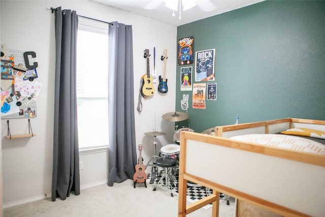 bedroom with carpet and baseboards