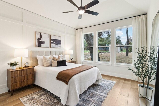 1313 Green Meadow Ln, Spring Branch, TX 78070 - bedroom featuring light wood finished floors, baseboards, and a ceiling fan