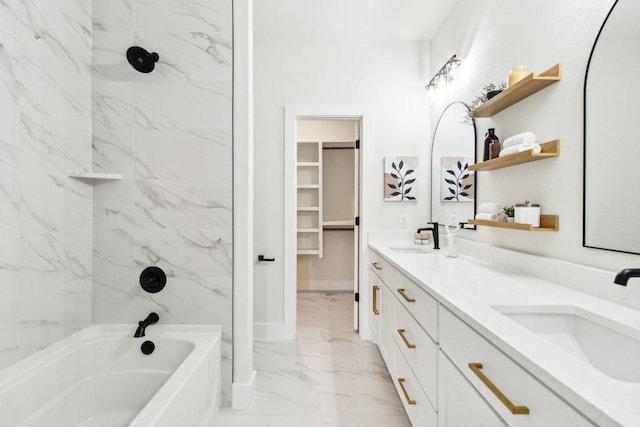 full bathroom with marble finish floor, a sink, double vanity, and shower / bathing tub combination
