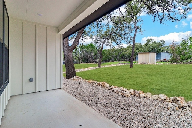 exterior space featuring an outbuilding and a storage unit