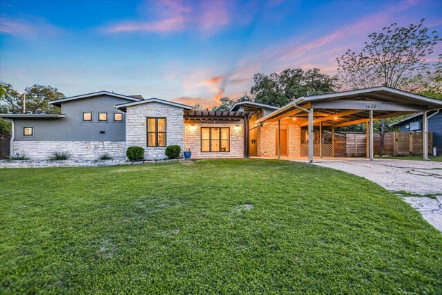 1403 Valleyridge Dr Unit A & B, Austin, TX 78704 - view of front of house featuring stone siding, a carport, and driveway