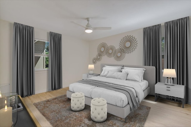 bedroom with ceiling fan and wood finished floors