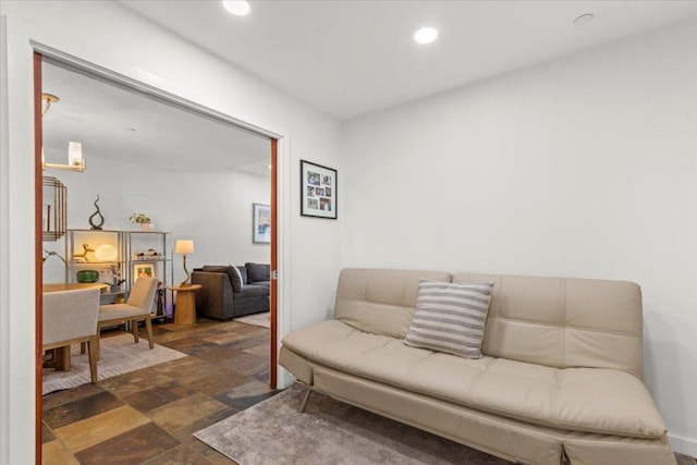 1812 W Ave Unit 306, Austin, TX 78701 - living room featuring stone finish floors and recessed lighting