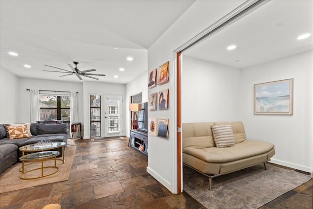 1812 W Ave Unit 306, Austin, TX 78701 - living area featuring recessed lighting, ceiling fan, and stone tile floors