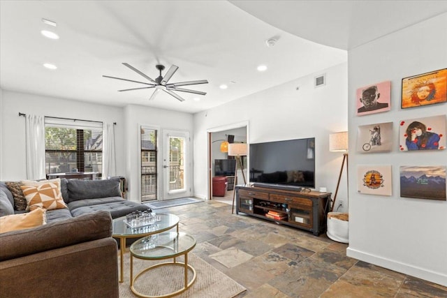1812 W Ave Unit 306, Austin, TX 78701 - living area featuring recessed lighting, stone tile flooring, and a ceiling fan