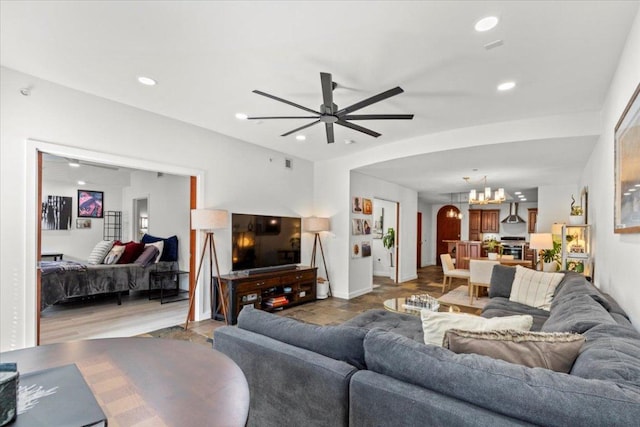 1812 W Ave Unit 306, Austin, TX 78701 - living area with a chandelier, recessed lighting, and a ceiling fan