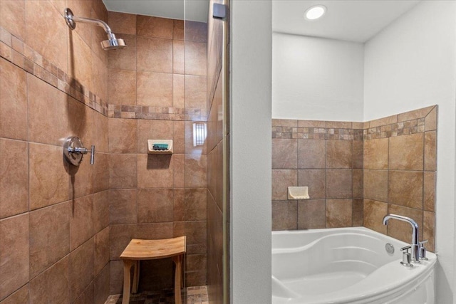 1812 W Ave Unit 306, Austin, TX 78701 - bathroom with a garden tub and tiled shower