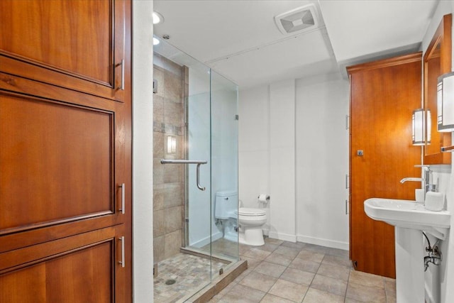 1812 W Ave Unit 306, Austin, TX 78701 - bathroom featuring a stall shower and tile patterned floors