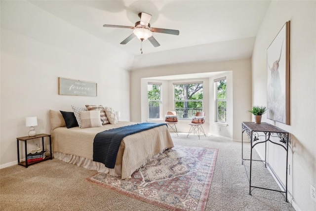 carpeted bedroom with baseboards and a ceiling fan