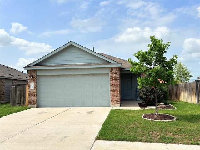 ranch-style home featuring brick siding, fence, driveway, a front yard, and an attached garage