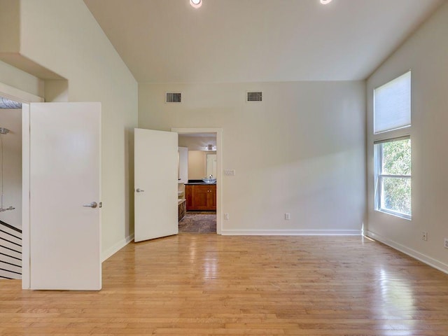 spare room with recessed lighting, visible vents, baseboards, and light wood-style floors