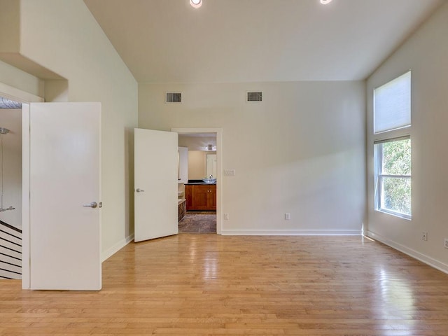 400 E 33rd St Unit 2, Austin, TX 78705 - empty room with light wood finished floors, baseboards, and recessed lighting