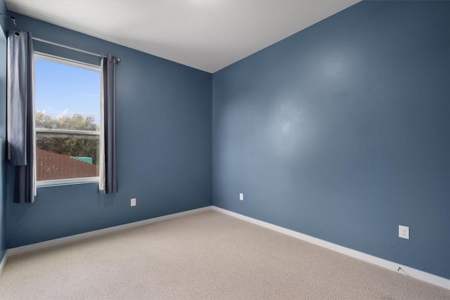 1101 Showbox St, Pflugerville, TX 78660 - carpeted empty room with healthy amount of natural light and baseboards