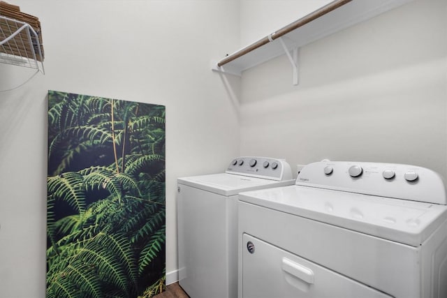 1101 Showbox St, Pflugerville, TX 78660 - laundry area with independent washer and dryer and wood finished floors