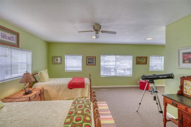1833 Highland Dr, Marble Falls, TX 78654 - carpeted bedroom featuring baseboards and ceiling fan