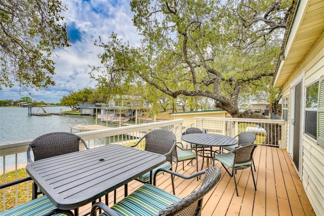 1833 Highland Dr, Marble Falls, TX 78654 - deck with outdoor dining space and a water view