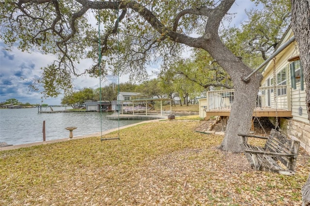 1833 Highland Dr, Marble Falls, TX 78654 - view of yard featuring a boat dock and a deck with water view