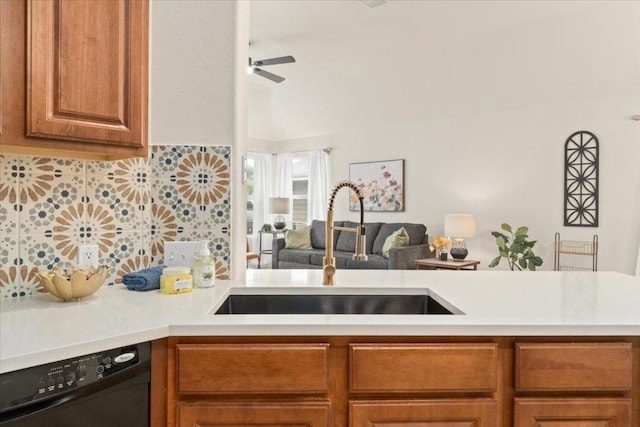 231 Skinner, Kyle, TX 78640 - kitchen with dishwasher, a sink, open floor plan, light countertops, and a ceiling fan