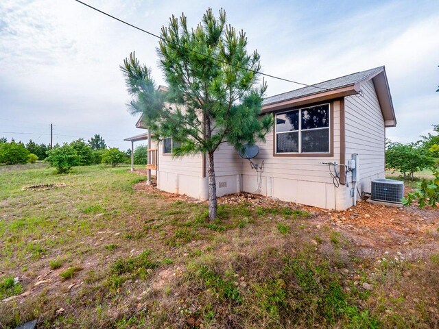 121 Hudson Rd, Smithville, TX 78957 - view of property exterior with a central air condition unit
