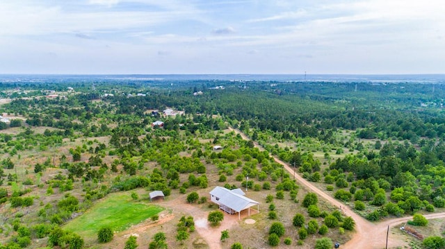 aerial view with a wooded view