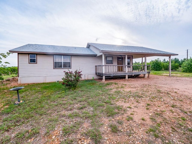 121 Hudson Rd, Smithville, TX 78957 - view of front of house featuring dirt driveway and a deck