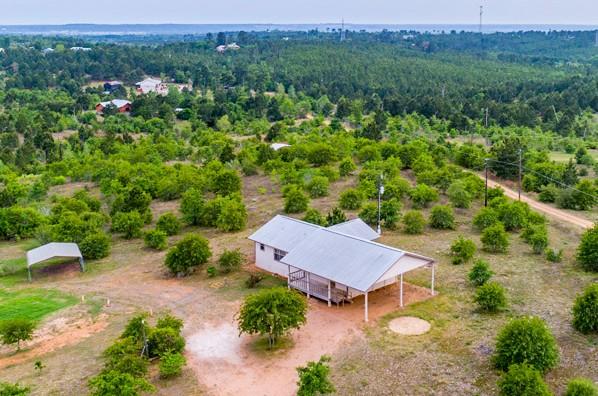 121 Hudson Rd, Smithville, TX 78957 - aerial view of a heavily wooded area