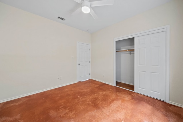 1159 Stallion Springs Dr, Fischer, TX 78623 - unfurnished bedroom featuring finished concrete flooring, baseboards, a closet, and a ceiling fan