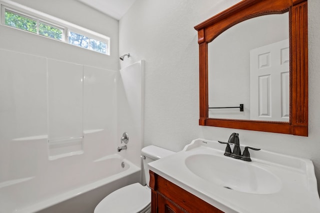 full bath with washtub / shower combination, toilet, and vanity