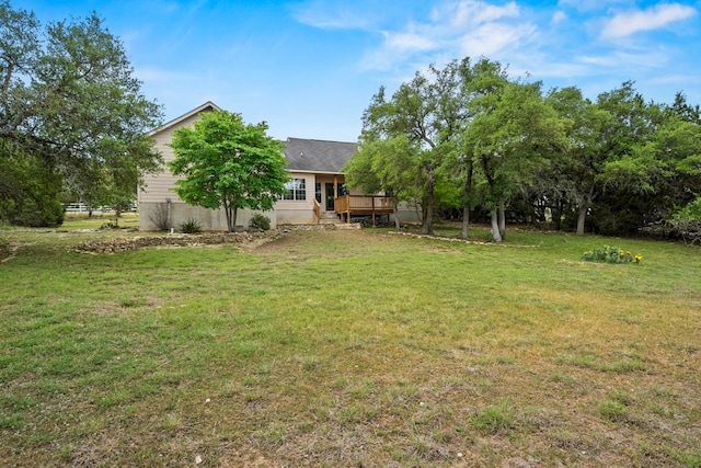 1159 Stallion Springs Dr, Fischer, TX 78623 - view of green lawn with a deck