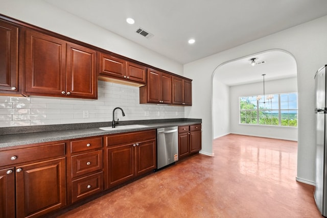 kitchen with a sink, visible vents, finished concrete floors, dark countertops, and appliances with stainless steel finishes