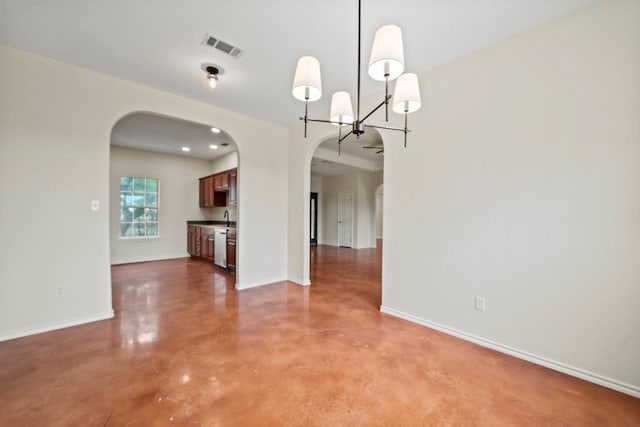 1159 Stallion Springs Dr, Fischer, TX 78623 - empty room with arched walkways and finished concrete floors