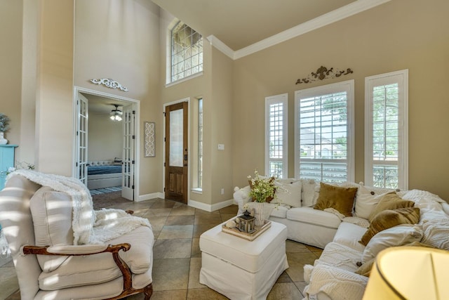 2600 Dalea St, Round Rock, TX 78681 - living area featuring baseboards, ornamental molding, a ceiling fan, and french doors