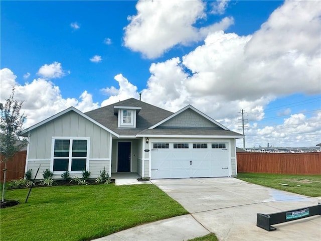 view of front facade featuring fence, board and batten siding, concrete driveway, and a garage